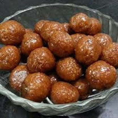 Kamarkattu (coconut jaggery balls) 100g